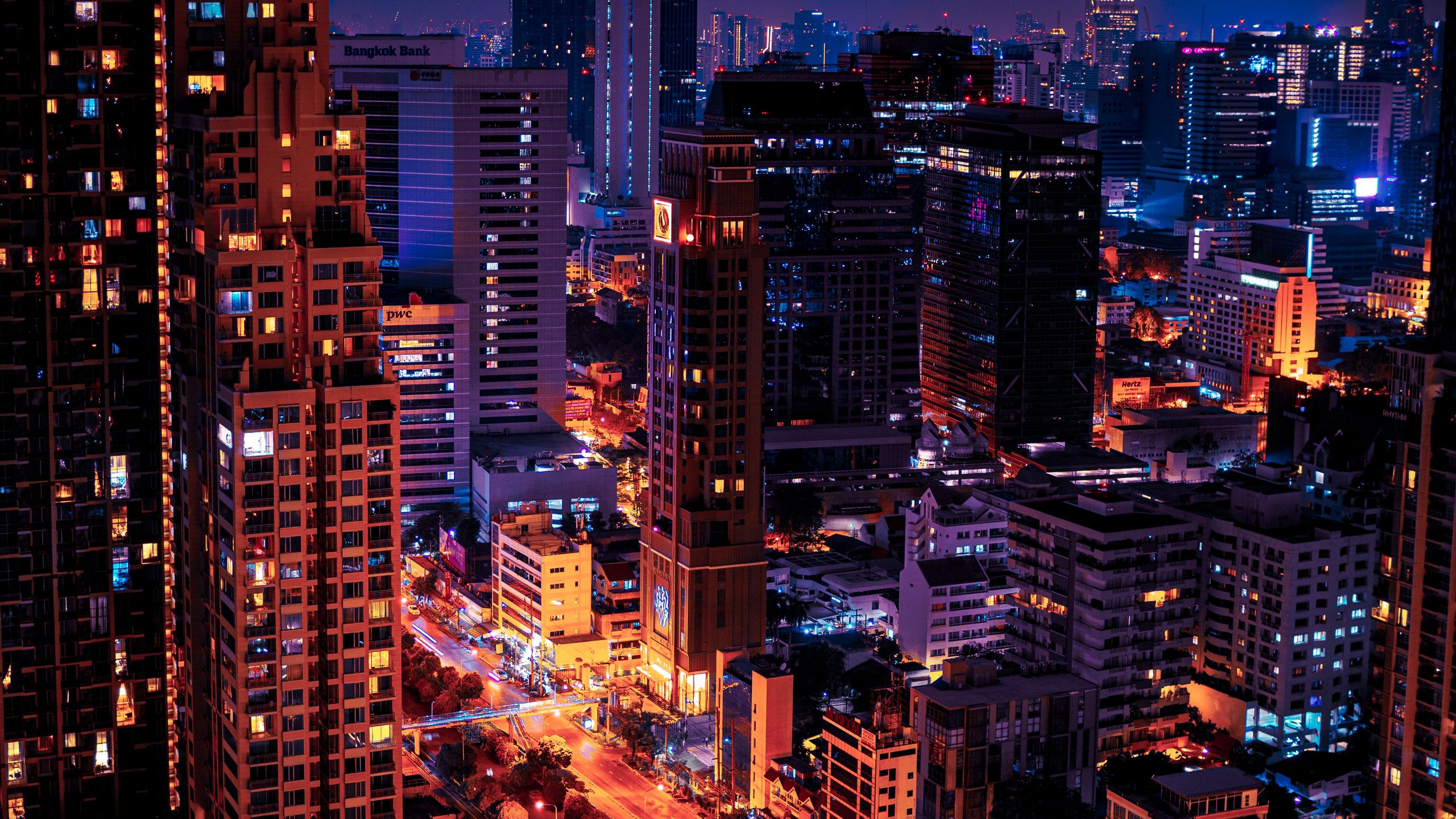 Download wallpaper 2560x1440 night city, glow, lights, dark widescreen