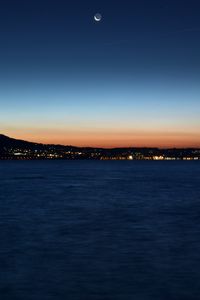 Preview wallpaper night city, horizon, sunset, night, sea, coast