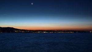 Preview wallpaper night city, horizon, sunset, night, sea, coast
