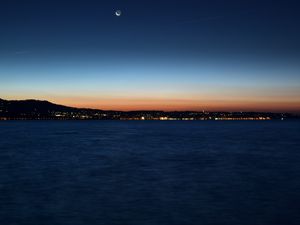 Preview wallpaper night city, horizon, sunset, night, sea, coast