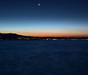Preview wallpaper night city, horizon, sunset, night, sea, coast