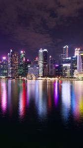 Preview wallpaper night city, lights, buildings, architecture, reflection