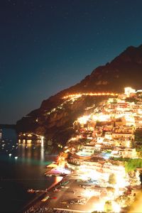 Preview wallpaper night city, lights, coast, beach, buildings