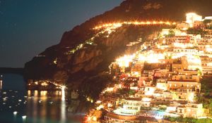 Preview wallpaper night city, lights, coast, beach, buildings