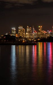 Preview wallpaper night city, lights, reflection, water