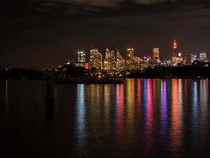 Preview wallpaper night city, lights, reflection, water