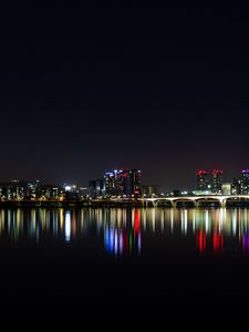 Preview wallpaper night city, panorama, city lights, horizon, sea