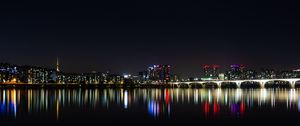 Preview wallpaper night city, panorama, city lights, horizon, sea