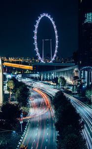 Preview wallpaper night city, road, buildings, ferris wheel, lights, long exposure