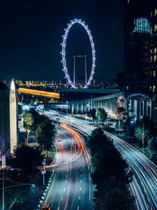 Preview wallpaper night city, road, buildings, ferris wheel, lights, long exposure