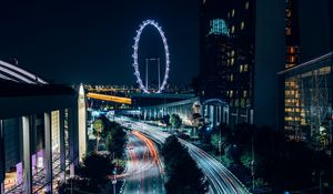 Preview wallpaper night city, road, buildings, ferris wheel, lights, long exposure