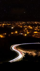 Preview wallpaper night city, road, long exposure, city lights, starry sky