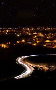 Preview wallpaper night city, road, long exposure, city lights, starry sky