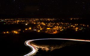 Preview wallpaper night city, road, long exposure, city lights, starry sky