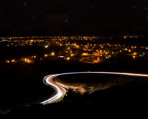 Preview wallpaper night city, road, long exposure, city lights, starry sky