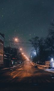 Preview wallpaper night city, road, snowfall, winter, twilight