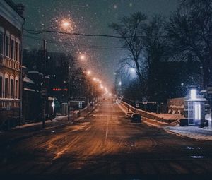 Preview wallpaper night city, road, snowfall, winter, twilight