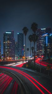 Preview wallpaper night city, roads, city lights, traffic, palm trees