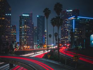 Preview wallpaper night city, roads, city lights, traffic, palm trees