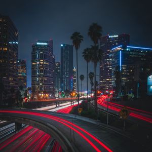 Preview wallpaper night city, roads, city lights, traffic, palm trees