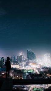 Preview wallpaper night city, roof, loneliness, silhouette, review