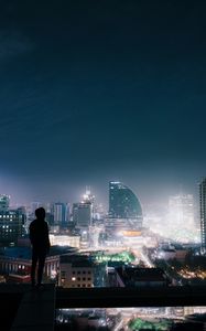 Preview wallpaper night city, roof, loneliness, silhouette, review