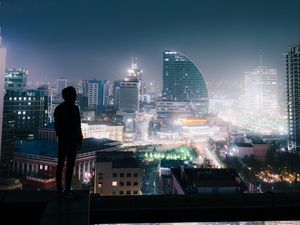 Preview wallpaper night city, roof, loneliness, silhouette, review