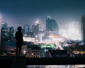 Preview wallpaper night city, roof, loneliness, silhouette, review