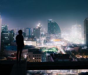 Preview wallpaper night city, roof, loneliness, silhouette, review