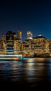 Preview wallpaper night city, shore, skyscrapers