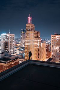 Preview wallpaper night city, silhouette, roof, buildings, lights, overview