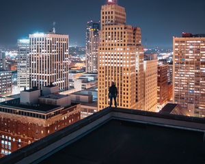 Preview wallpaper night city, silhouette, roof, buildings, lights, overview