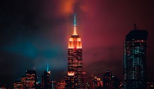Preview wallpaper night city, skyscraper, tower, clouds, night