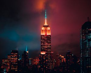 Preview wallpaper night city, skyscraper, tower, clouds, night