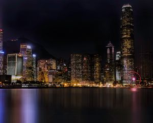 Preview wallpaper night city, skyscrapers, beach