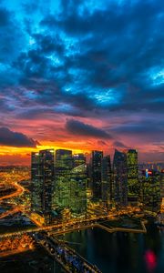 Preview wallpaper night city, skyscrapers, metropolis, sunset, clouds