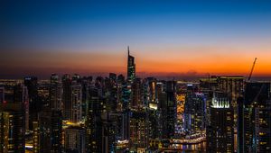 Preview wallpaper night city, skyscrapers, sunset, aerial view, city lights, architecture