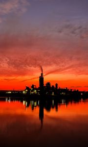 Preview wallpaper night city, sunset, sky, factory, horizon