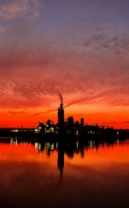 Preview wallpaper night city, sunset, sky, factory, horizon