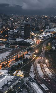 Preview wallpaper night city, top view, buildings, railway