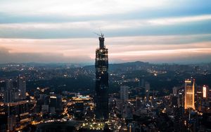 Preview wallpaper night city, tower, buildings, lights, dusk