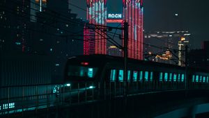Preview wallpaper night city, train, buildings, architecture, backlight