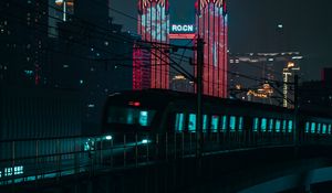 Preview wallpaper night city, train, buildings, architecture, backlight
