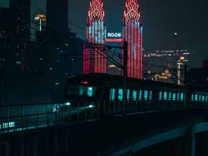 Preview wallpaper night city, train, buildings, architecture, backlight