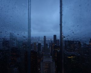 Preview wallpaper night city, window, rain, skyscrapers, aerial view