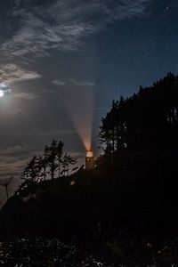 Preview wallpaper night, lighthouse, mountain, trees, sea