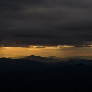 Preview wallpaper night, mountains, clouds, horizon, dark, overcast