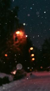 Preview wallpaper night, snow, glare, blur, bokeh