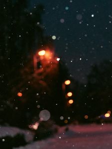 Preview wallpaper night, snow, glare, blur, bokeh