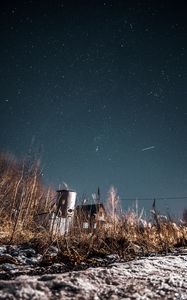 Preview wallpaper night, starry sky, bushes, buildings, abandoned, countryside